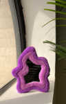 trendy tufted mirror